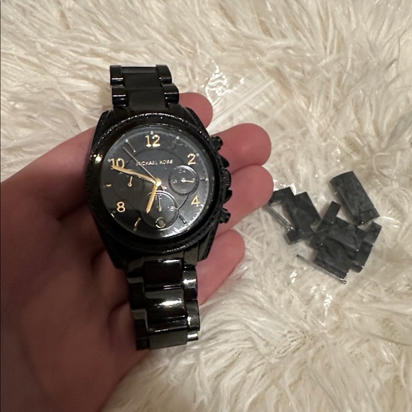 Michael Kors Glossy Black Watch with gold details